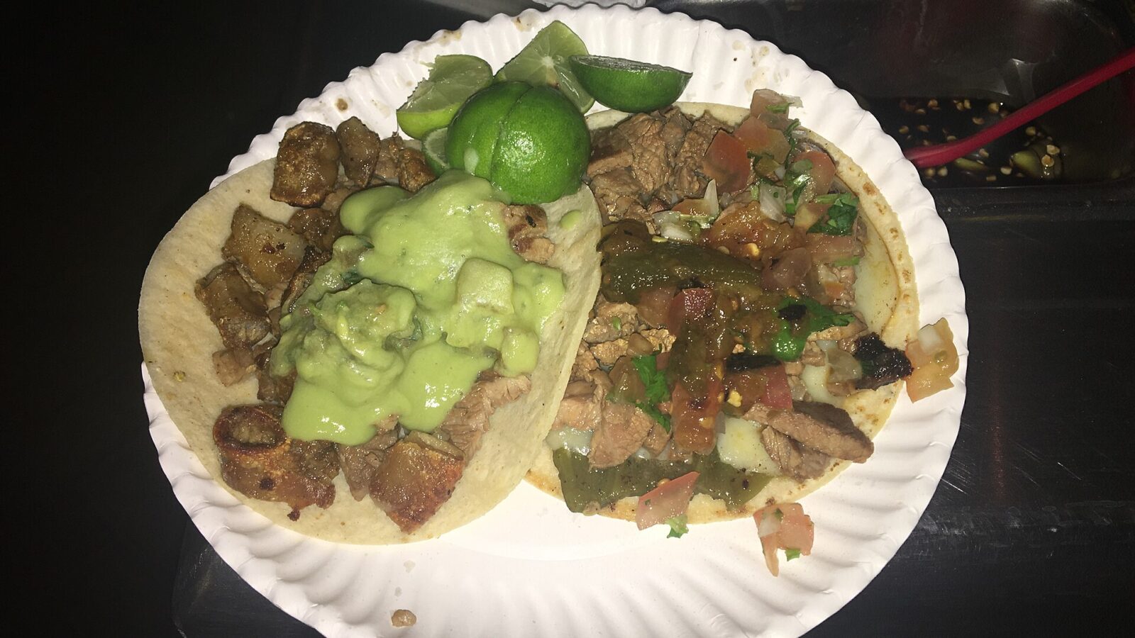 Street tacos with seared beef, salsa, and lime